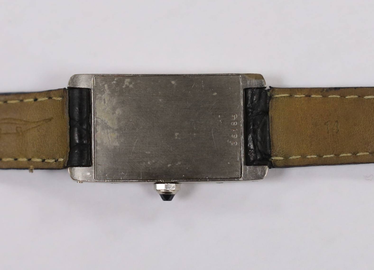 A mid 20th century 18ct white gold Cartier Tank Americane manual wind wrist watch